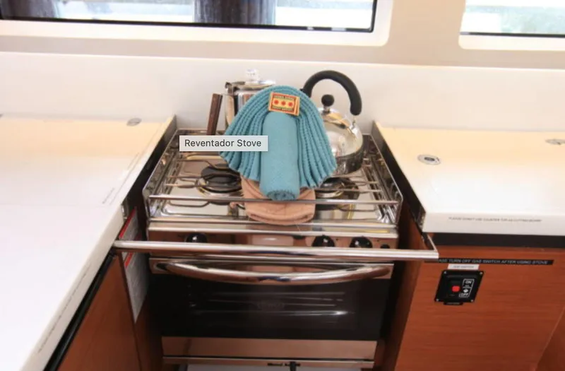 Slide: The Image of Jeanneau Sun Odyssey 440 kitchen with Reventador stove, 2018 model. - 18