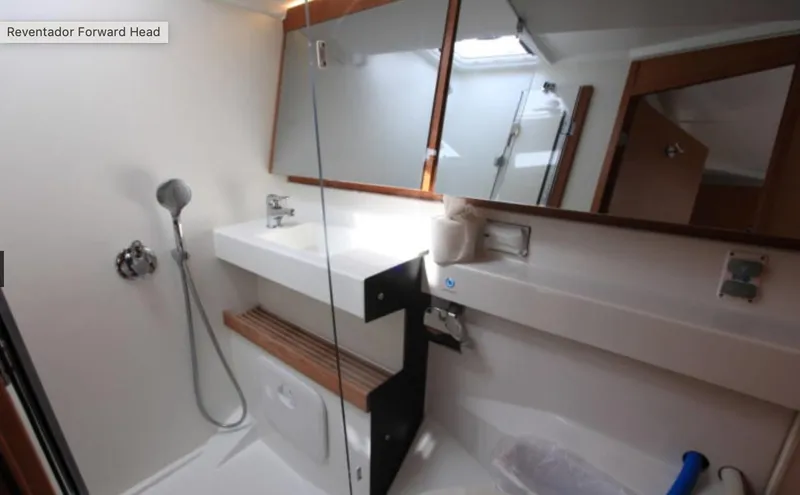 Slide: The Image of Jeanneau Sun Odyssey 440 bathroom interior, featuring modern fixtures and wooden accents, 2018 model. - 32
