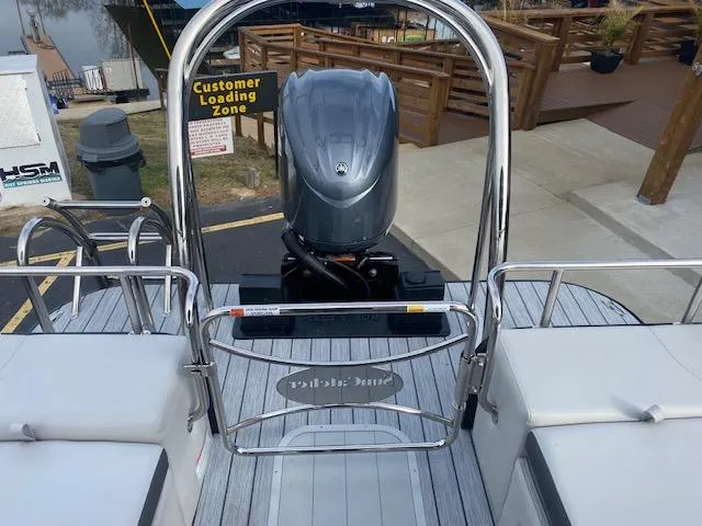 Slide: The Image of 2024 SunCatcher Elite 324 SS pontoon boat with Yamaha outboard motor at dock. - 15