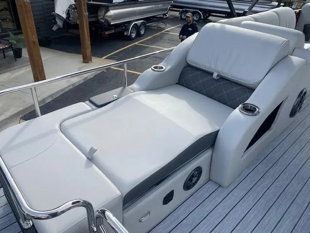Slide: The Image of 2024 SunCatcher Elite 324 SS luxury boat with spacious lounge seating. - 17