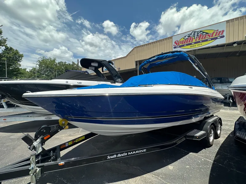 The Image of 2024 Monterey 224 FS boat with blue cover on trailer at South Austin Marine. - 0