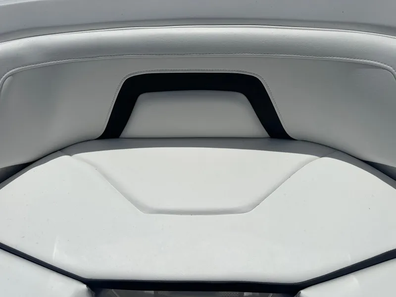 Slide: The Image of 2024 Monterey 224 FS boat interior with sleek white seating design. - 12