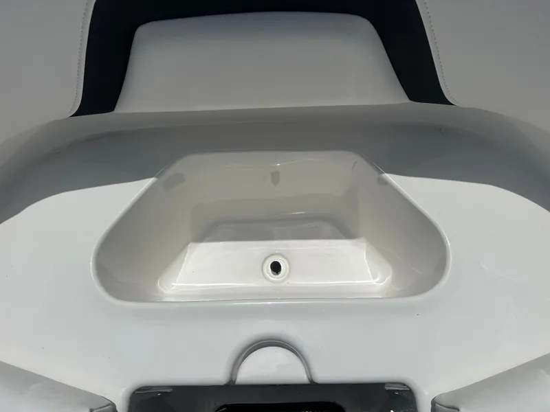 Slide: The Image of 2024 Monterey 224 FS boat interior detail, featuring sleek white and gray design. - 13