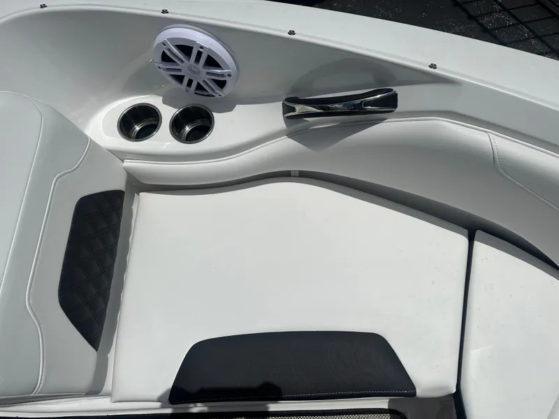 Slide: The Image of 2024 Monterey 224 FS boat interior with speaker and cup holders. - 14