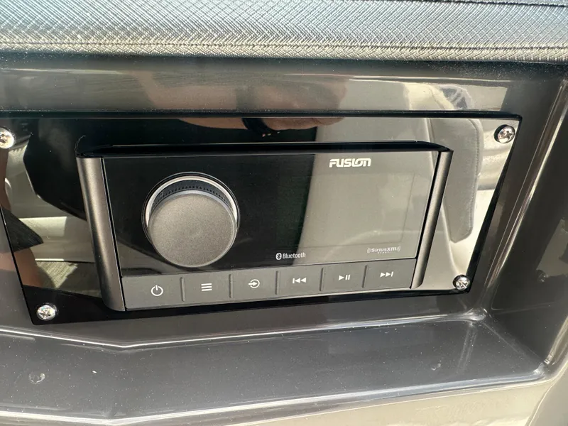 Slide: The Image of Fusion Bluetooth stereo system in 2024 Monterey 224 FS boat dashboard. - 20