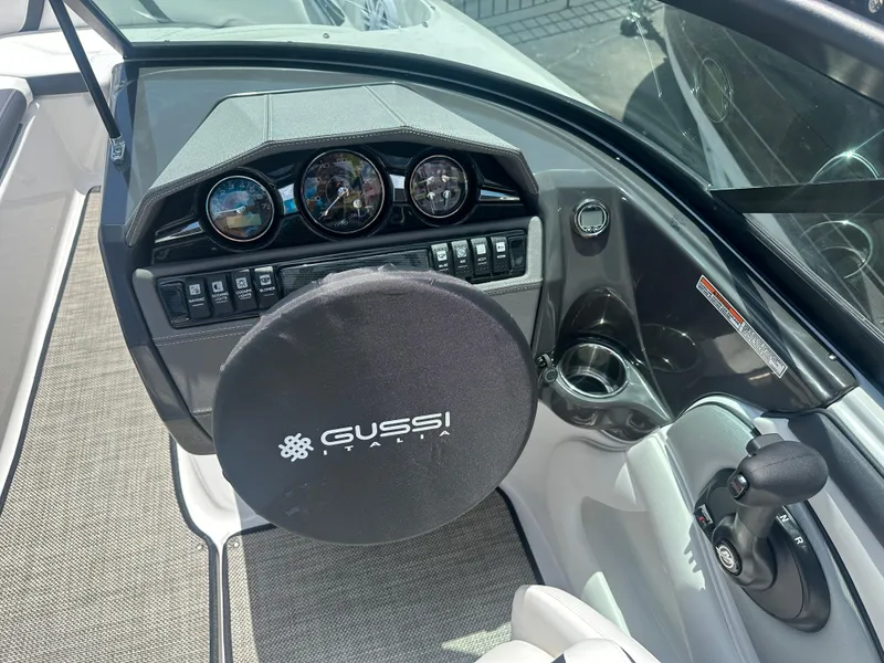 Slide: The Image of 2024 Monterey 224 FS boat dashboard with Gussi Italia steering wheel cover. - 23