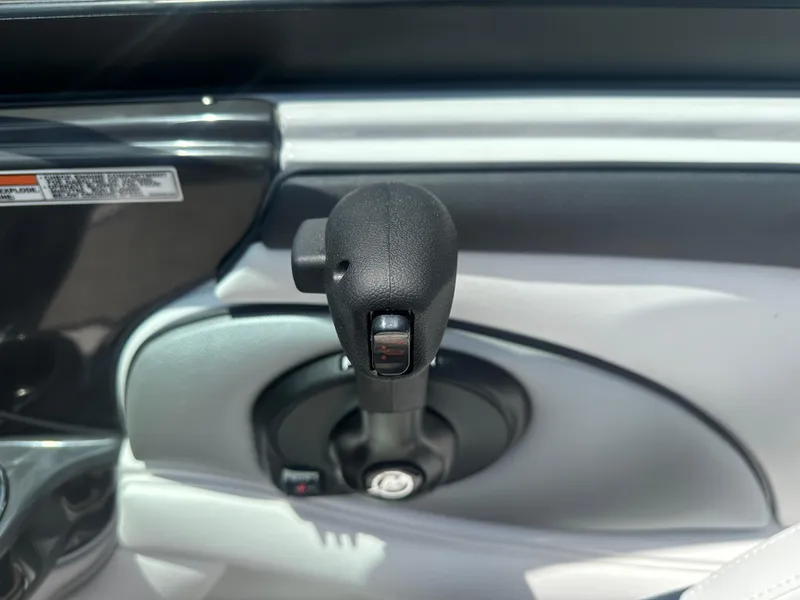 Slide: The Image of Close-up of 2024 Monterey 224 FS boat throttle control. - 28