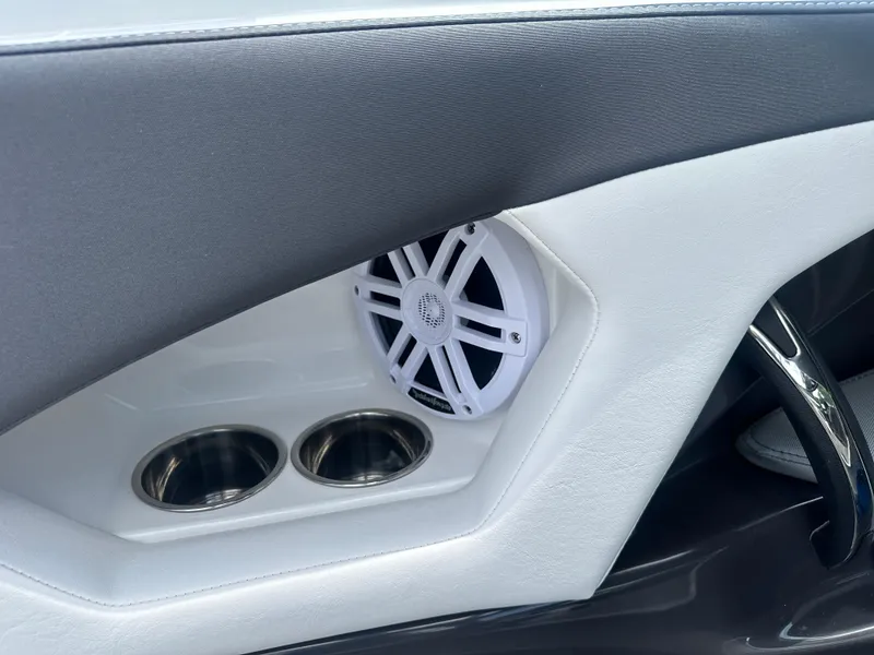 Slide: The Image of 2024 Monterey 224 FS boat interior with speaker and cup holders. - 41