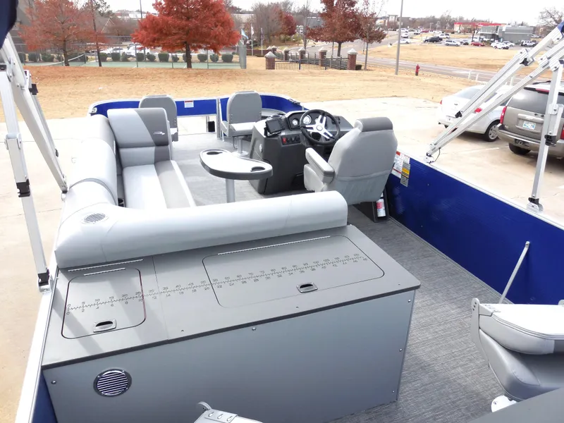 Slide: The Image of 2024 Bennington 22 SVF pontoon boat interior with seating and helm station. - 8