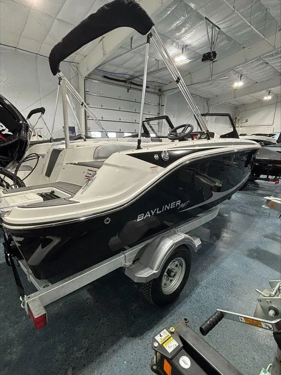Slide: The Image of 2024 Bayliner M17 boat on trailer in indoor showroom. - 10