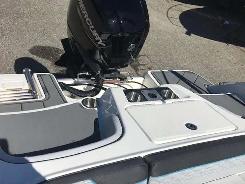 Slide: The Image of 2024 Bayliner M17 boat with Mercury outboard motor and seating area. - 11