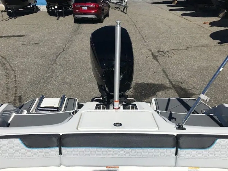 Slide: The Image of 2024 Bayliner M17 boat rear view with outboard motor. - 3