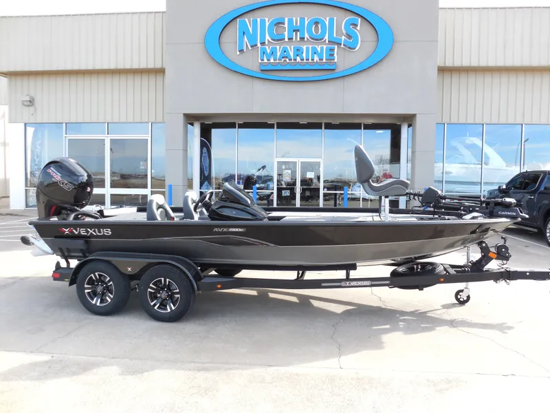 Slide: The Image of 2024 Vexus AVX 1980C boat displayed at Nichols Marine dealership. - 1