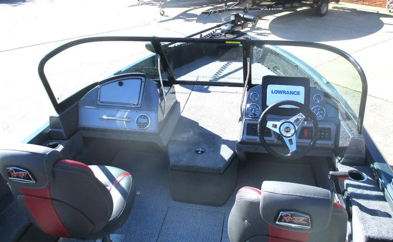 Slide: The Image of 2024 Ranger VS1682SC Angler boat interior with steering console and seating. - 4