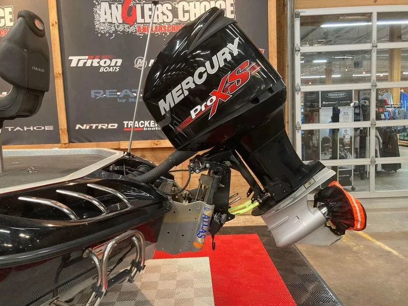 Slide: The Image of 2014 Ranger Z521C boat with Mercury Pro XS outboard motor in showroom. - 3