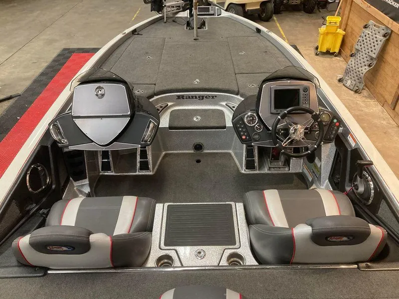Slide: The Image of 2014 Ranger Z521C boat interior with dual consoles and advanced navigation system. - 5