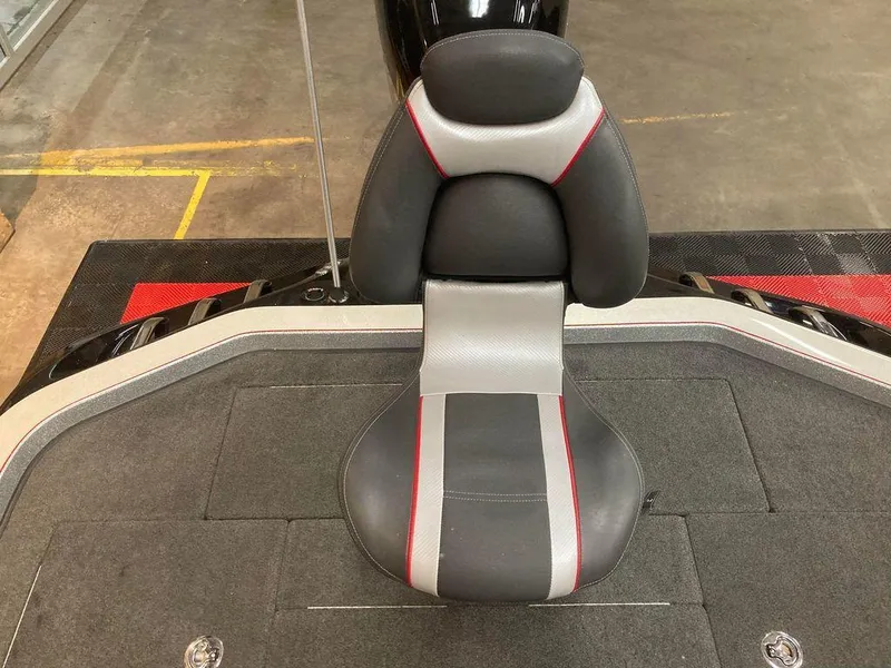 Slide: The Image of 2014 Ranger Z521C boat seat with gray and red accents. - 8