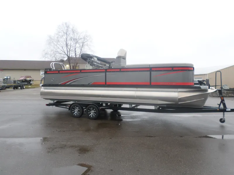 Slide: The Image of 2024 Angler Quest 8524 Family Fish LTZ pontoon boat on trailer, side view. - 1
