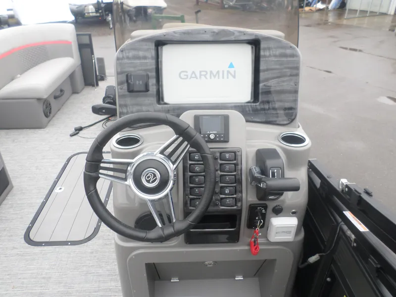 Slide: The Image of 2024 Angler Quest 8524 Family Fish LTZ boat dashboard with Garmin navigation system. - 6