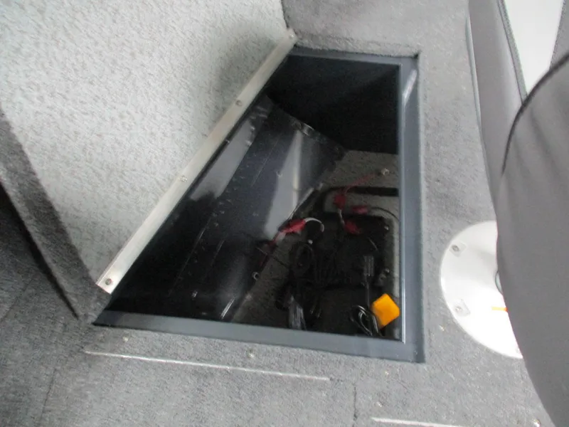Slide: The Image of Open storage compartment in 2024 Lund 1650 Rebel XL Sport boat. - 6