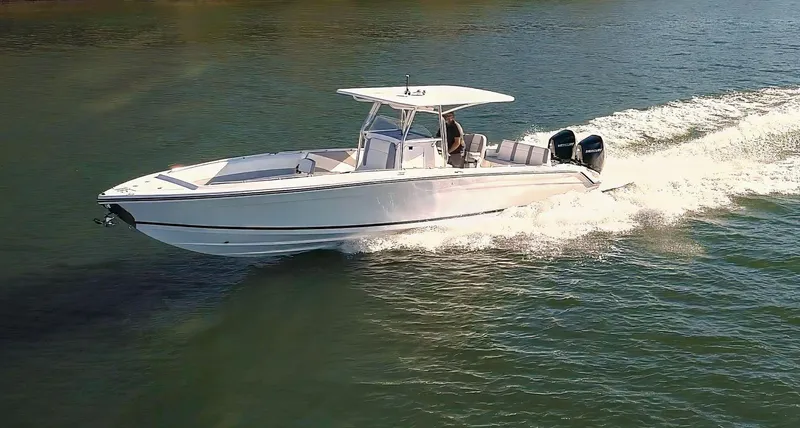 Slide: The Image of 2025 Marlago 35SS boat cruising on open water. - 0