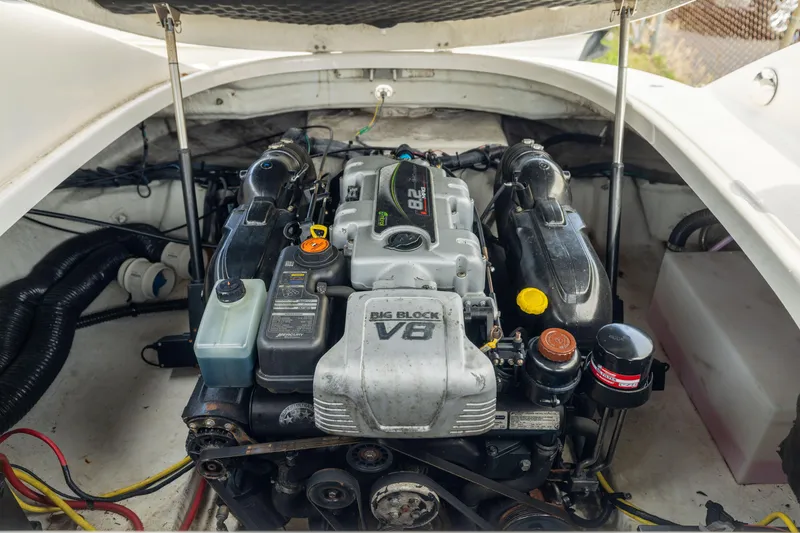 Slide: The Image of Engine compartment of a 2015 Chaparral 287 SSX boat, featuring a Big Block V8 engine. - 20