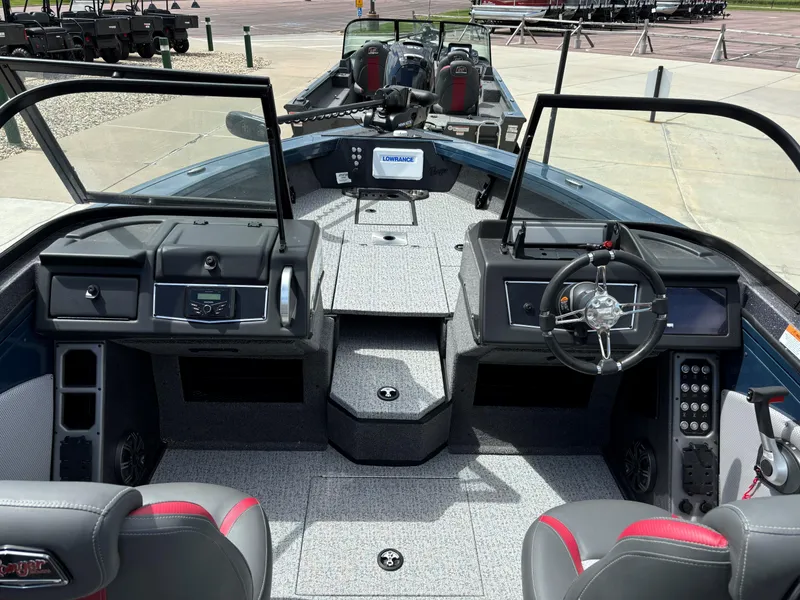 Slide: The Image of 2024 Ranger VX1788 WT boat interior with steering console and seating. - 5