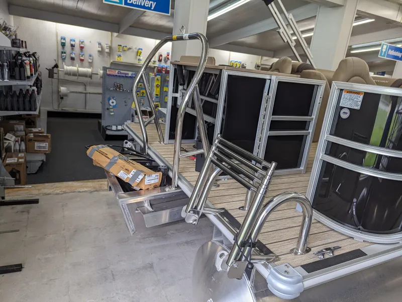 Slide: The Image of 2024 Sylvan Mirage Fish 8522 Party Fish pontoon boat in showroom. - 12