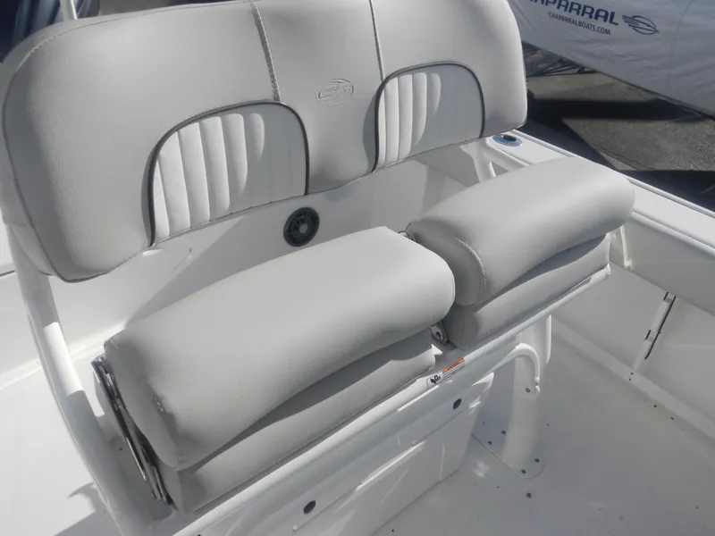 Slide: The Image of 2024 Sea Fox 248 Commander boat seating with cushioned backrest and armrests. - 10
