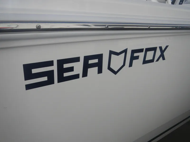 Slide: The Image of 2024 Sea Fox 248 Commander boat side view with logo - 15