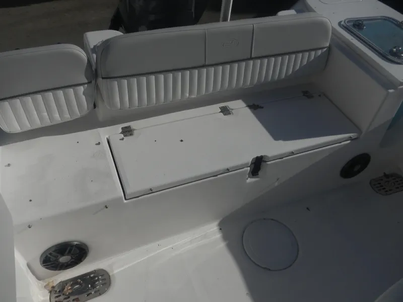 Slide: The Image of 2024 Sea Fox 248 Commander boat seating and storage area. - 9