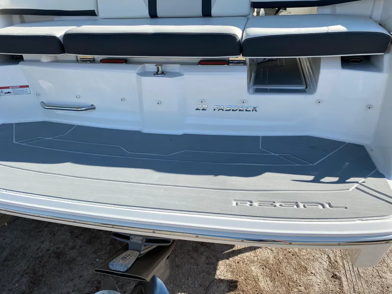 Slide: The Image of 2017 Regal 22 FasDeck boat rear seating and swim platform. - 16