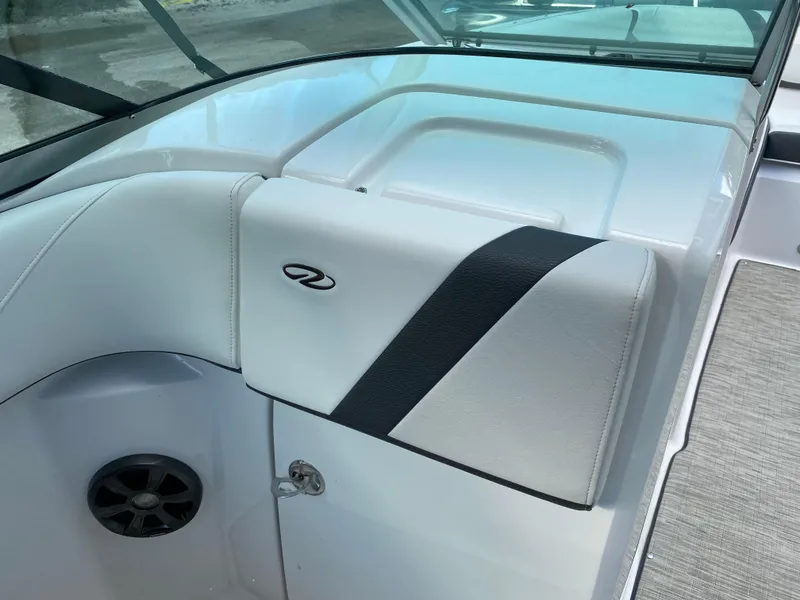 Slide: The Image of 2017 Regal 22 FasDeck boat interior with white and black seating. - 29