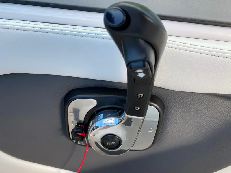 Slide: The Image of 2017 Regal 22 FasDeck throttle control lever on boat interior. - 30