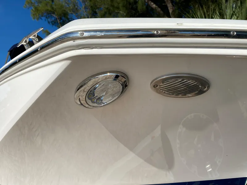 Slide: The Image of Close-up of 2017 Regal 22 FasDeck boat's exterior light and vent. - 31