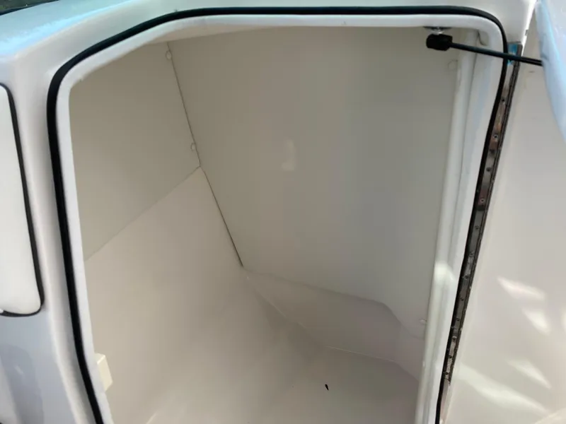 Slide: The Image of Storage compartment of a 2017 Regal 22 FasDeck boat. - 33