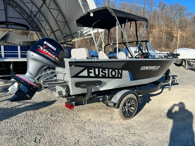 Slide: The Image of 2024 Starweld 18 Fusion boat with Yamaha outboard motor on a trailer. - 10