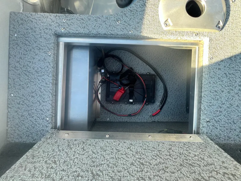 Slide: The Image of Battery compartment of 2024 Starweld 18 Fusion boat with wiring. - 11
