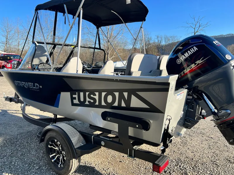 Slide: The Image of 2024 Starweld 18 Fusion boat with Yamaha outboard motor on trailer. - 12
