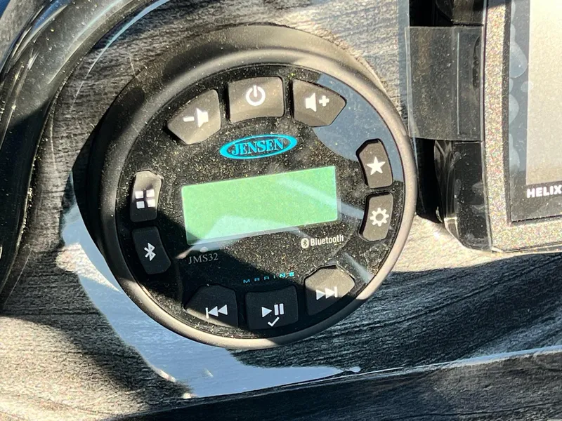 Slide: The Image of Jensen JMS32 Bluetooth marine stereo on 2024 Starweld 18 Fusion boat dashboard. - 14