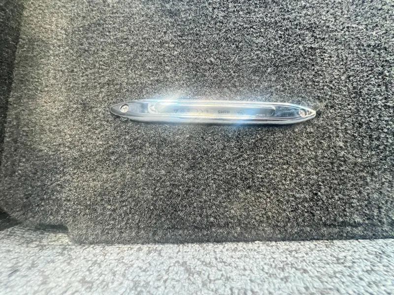 Slide: The Image of Close-up of 2024 Starweld 18 Fusion boat interior with carpeted flooring. - 15