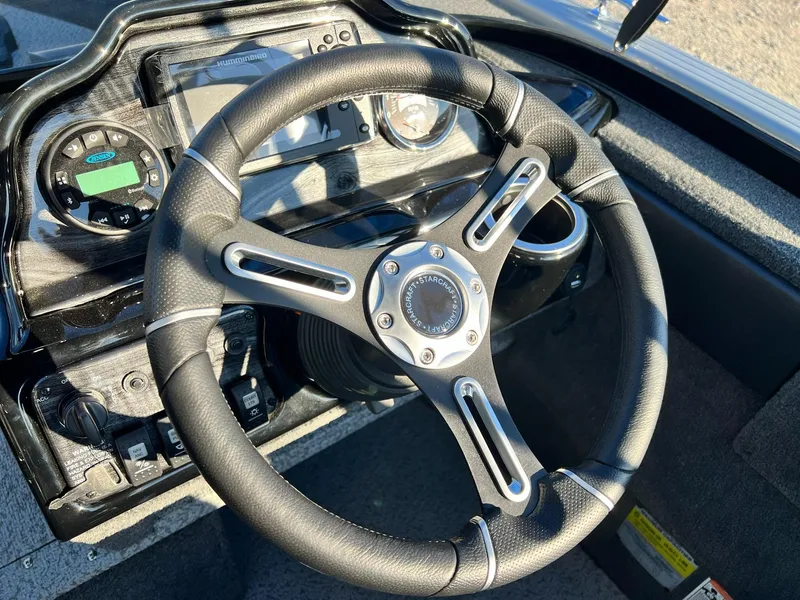 Slide: The Image of Steering wheel and dashboard of 2024 Starweld 18 Fusion boat. - 17