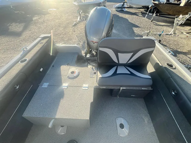 Slide: The Image of 2024 Starweld 18 Fusion boat interior with seating and motor. - 22