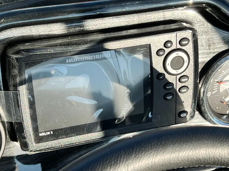 Slide: The Image of Humminbird Helix 5 fish finder on 2024 Starweld 18 Fusion boat dashboard. - 28