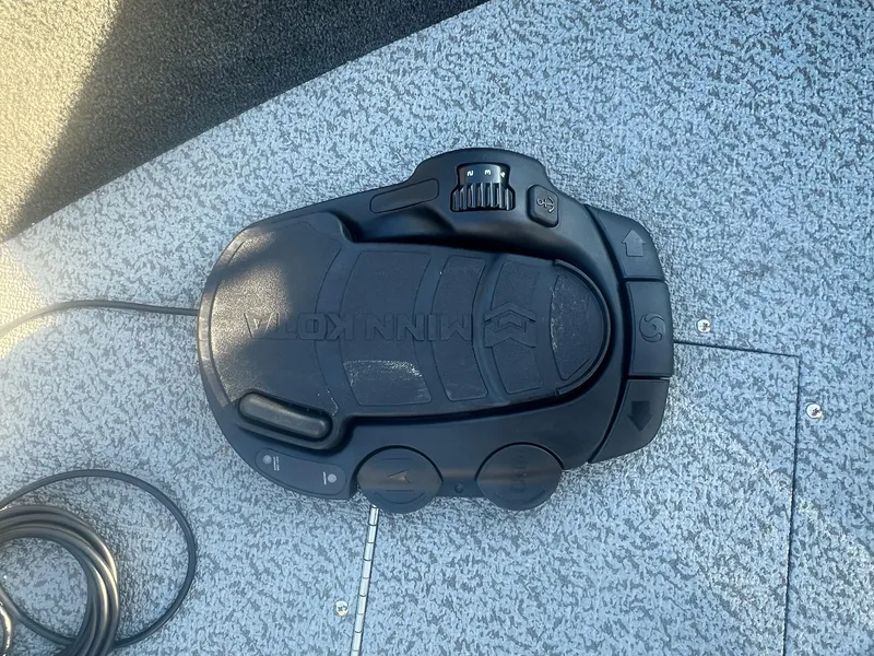 Slide: The Image of Minn Kota foot pedal on 2024 Starweld 18 Fusion boat deck. - 4