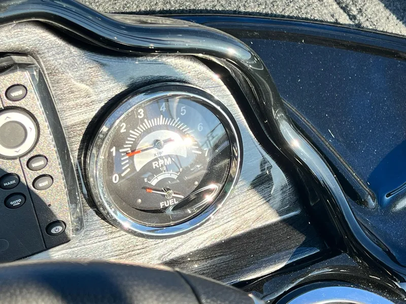 Slide: The Image of Close-up of the dashboard of a 2024 Starweld 18 Fusion boat showing RPM and fuel gauges. - 40