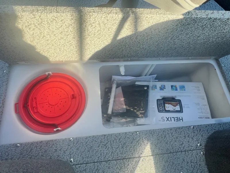 Slide: The Image of Storage compartment in 2024 Starweld 18 Fusion boat with Helix 5 fish finder. - 8