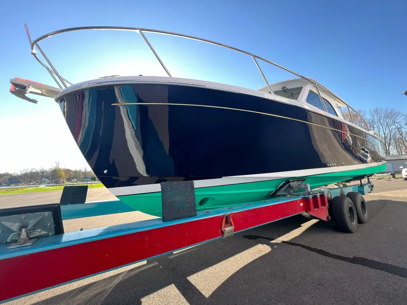 Slide: The Image of 2017 Back Cove Downeast 37 boat on a trailer, side view. - 3