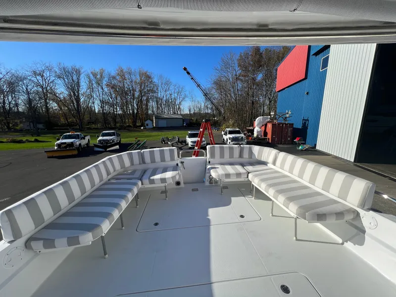 Slide: The Image of 2017 Back Cove Downeast 37 boat with spacious outdoor seating area. - 47