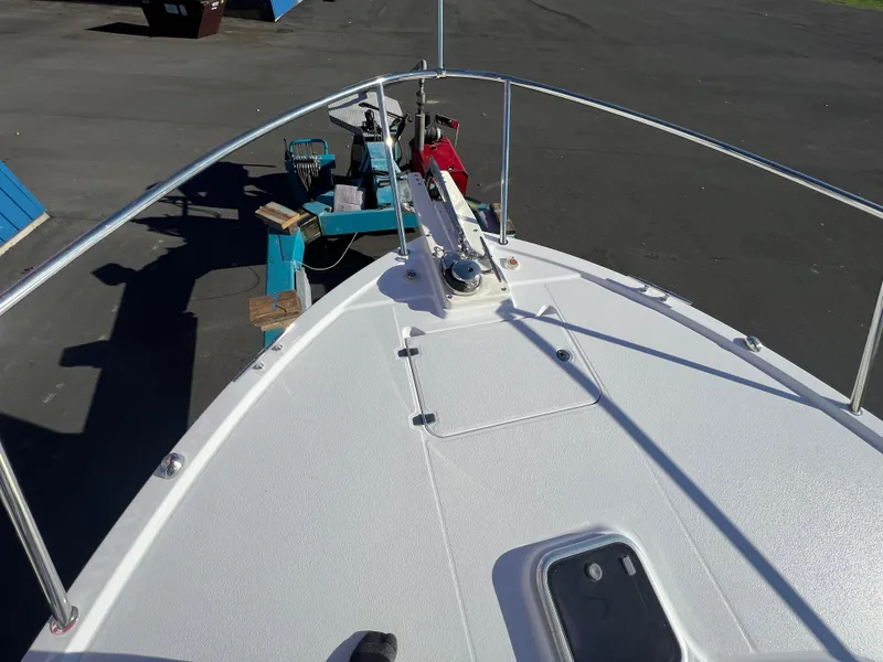 Slide: The Image of 2017 Back Cove Downeast 37 boat bow view on trailer. - 20